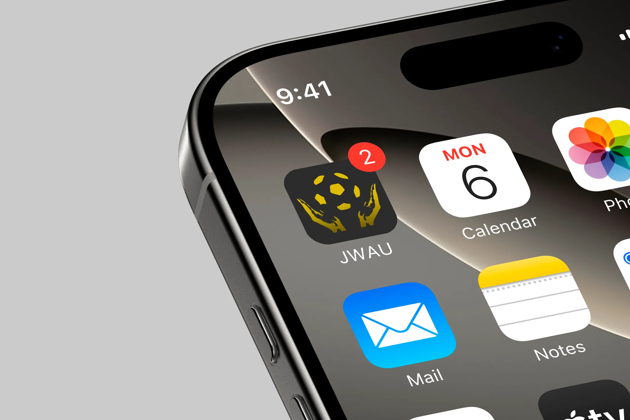 The JWAU app icon on an iPhone home screen